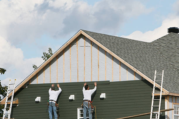 Professional Emergency Siding Repair technician working in Sutersville, PA